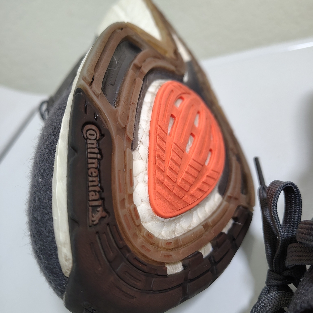 adidas Athletic Shoes with Orange and Brown Accents